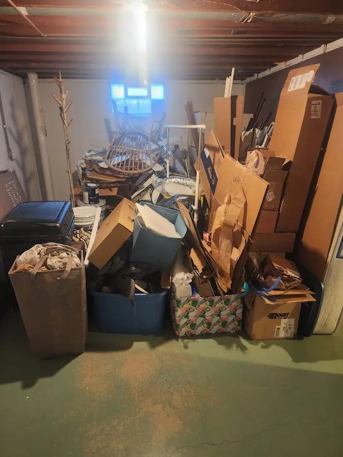 Roll-off dumpster container at job site for Yard Waste Dumpster Rental in Boaz